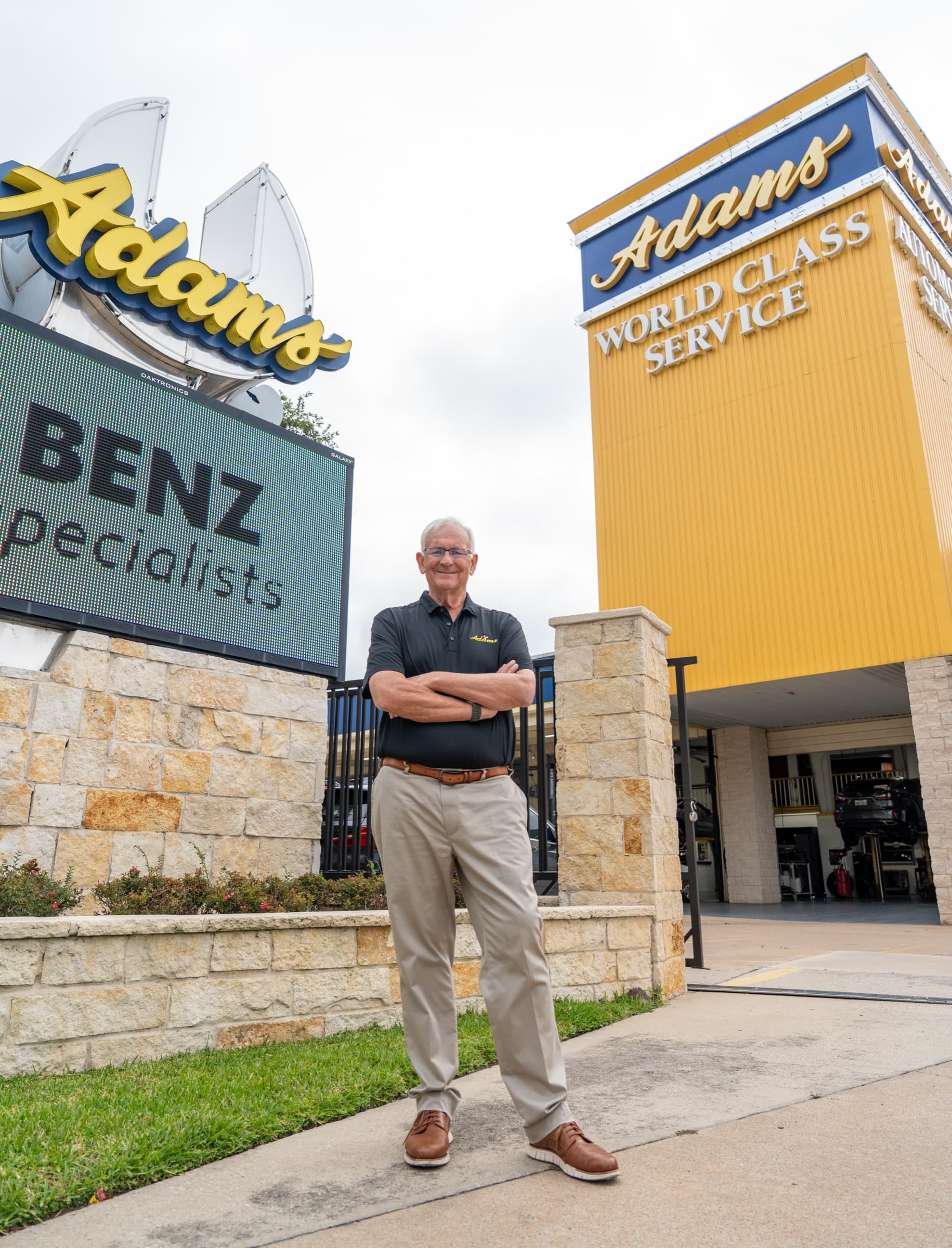 Todd Hayes standing outside the Adams Automotive flagship in Houston